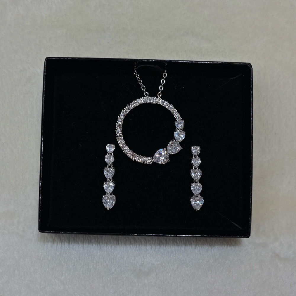 Vintage Nolan Miller Circle of Love Necklace and Earrings Set